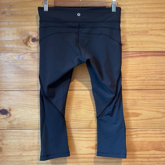 Lululemon Black Cut Out Mid Rise Crop 19” Activewear Workout Leggings 6 - Picture 2 of 9